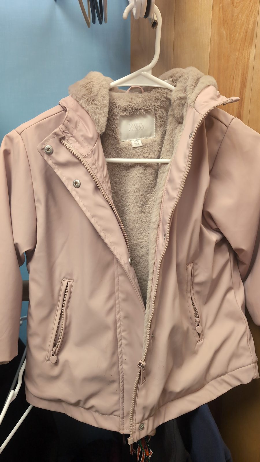 Pink rain coat.