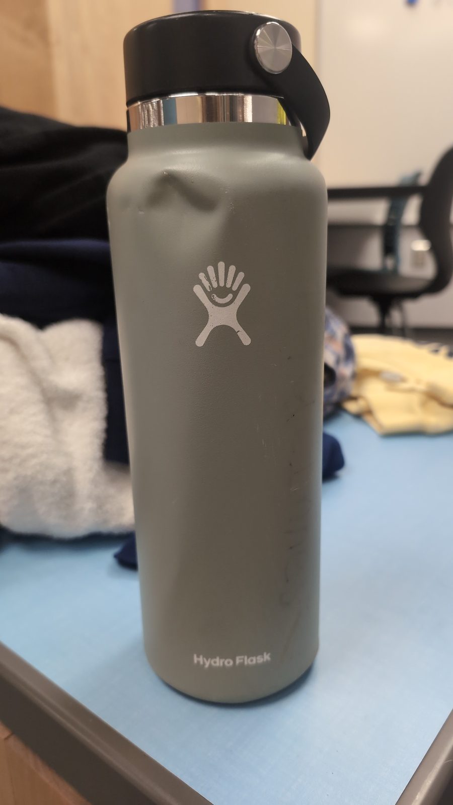 Gray, blue, and brown water bottle large hydro flask