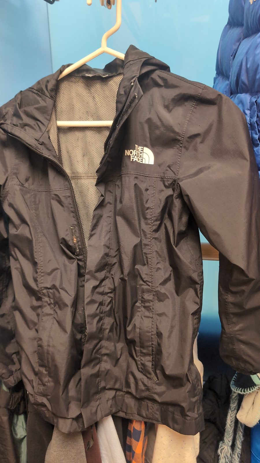 Black raincoat, North face
