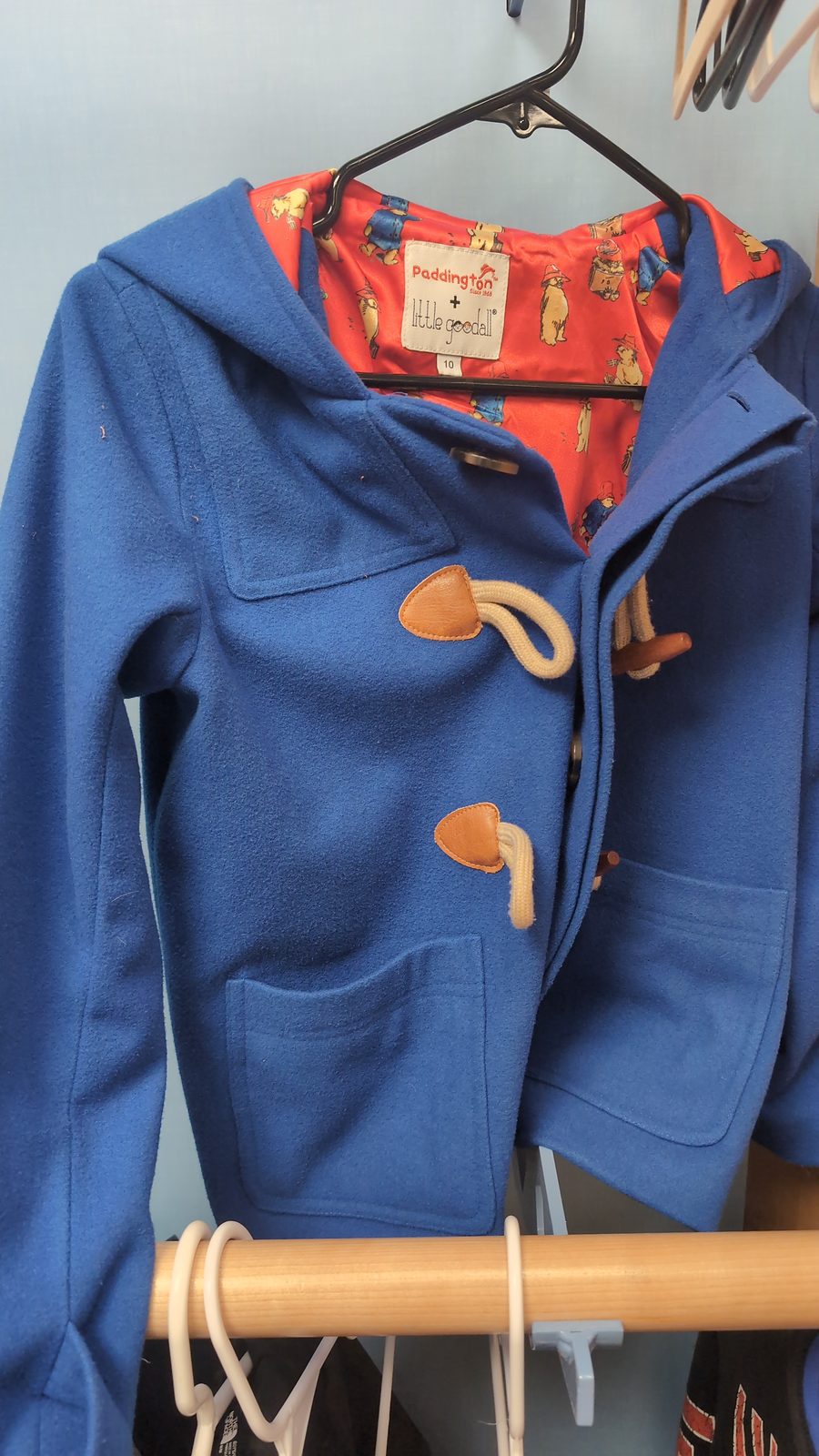 Navy, blue, and gray coat, child-sized.